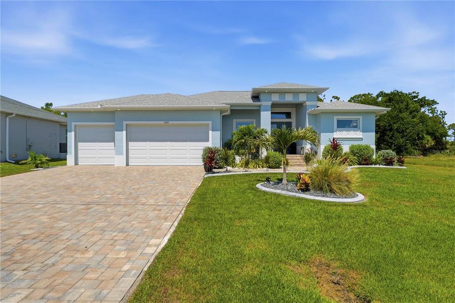 Front exterior of a new home in , Rotonda West, FL, highlighting curb appeal (Image 22).