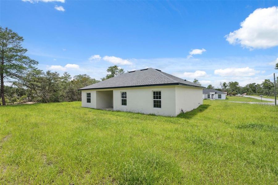 Front exterior of a new home in , Ocala, FL, highlighting curb appeal (Image 28).