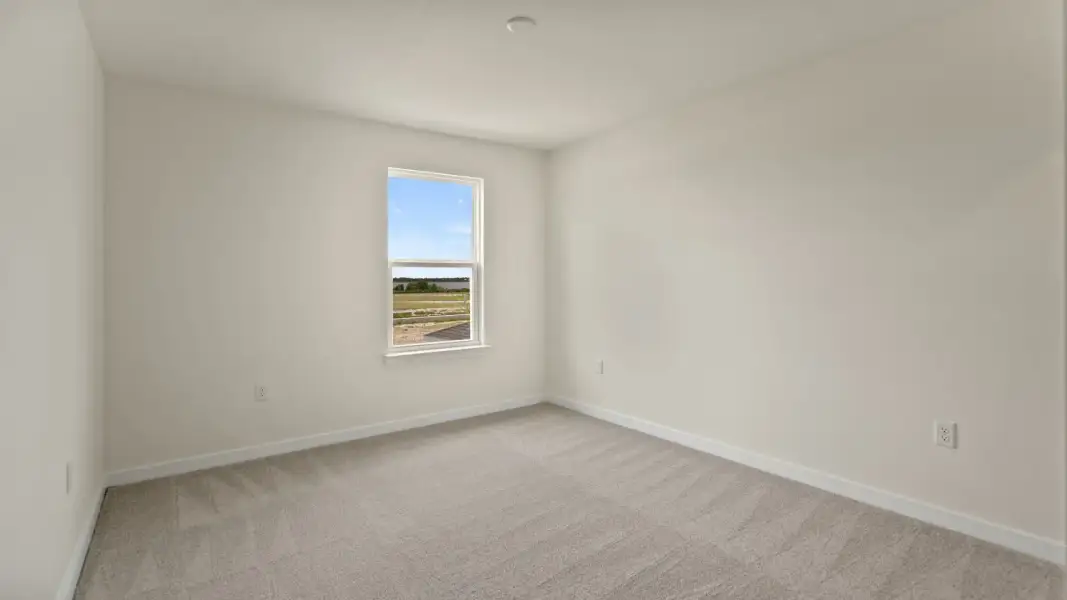 The Naples Second Floor Second Bedroom in Quick Move-In Home at Willowbrook North by DRB Homes in Winter Haven, FL
