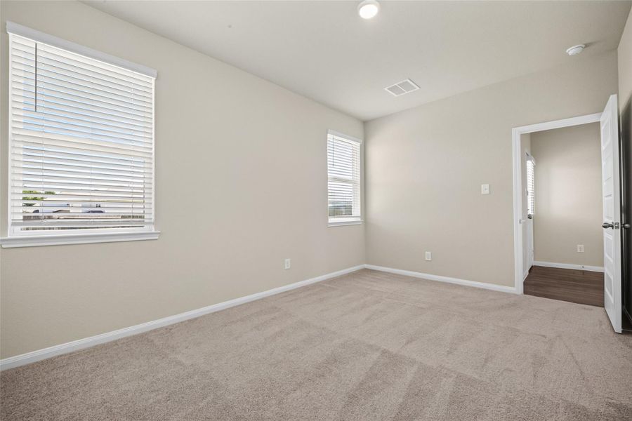 Spacious, unfurnished interior of a new home in River's Edge, Conroe (Image 34). Spacious, unfurnished interior of a new home in River's Edge, Conroe (Image 34).