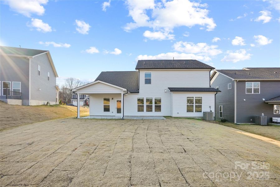 Exterior details and patio area of a home in Forest Creek, Waxhaw (Image 28).