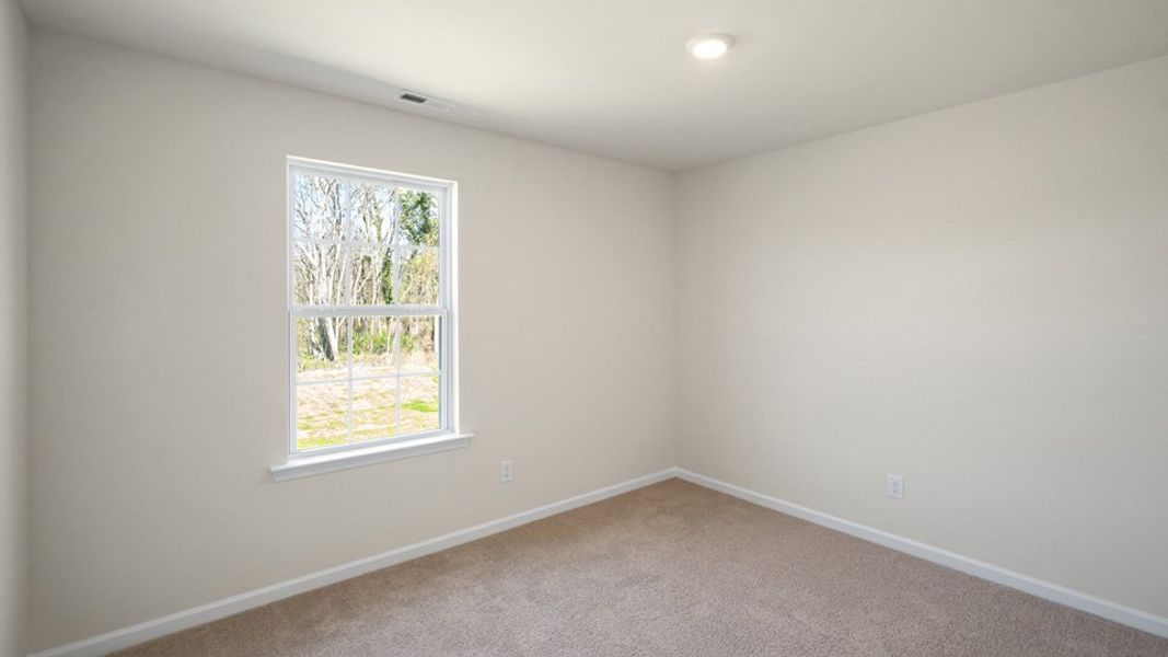 Spacious, unfurnished interior of a new home in Madeline Farm, New Bern (Image 28).