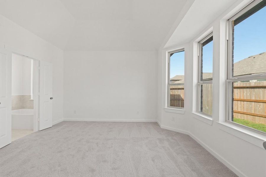Spacious, unfurnished interior of a new home in Sunterra, Katy (Image 20).