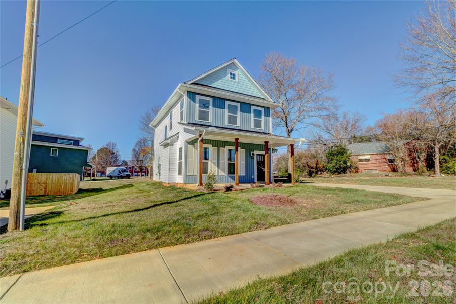Front exterior of a new home in , Shelby, NC, highlighting curb appeal (Image 18).