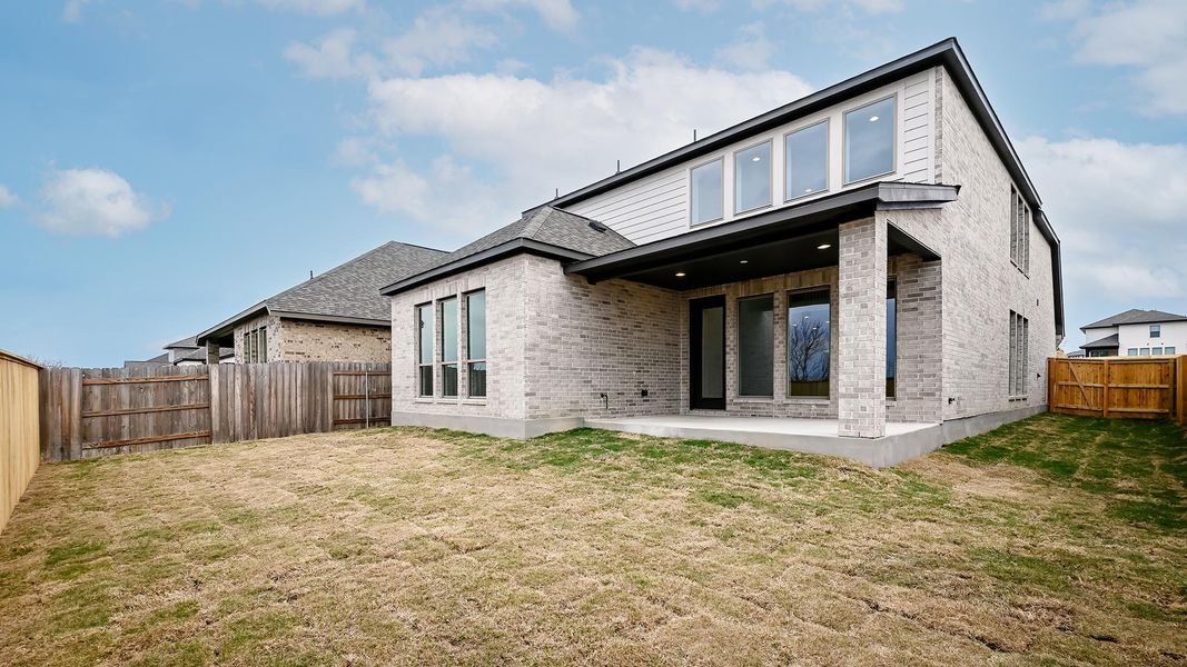 Exterior details and patio area of a home in Crosswinds, Kyle (Image 3).