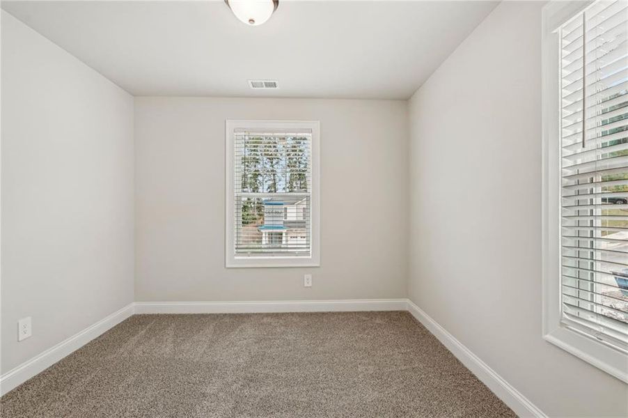 Spacious, unfurnished interior of a new home in Hemingway - Reserve Series, Cumming (Image 52).