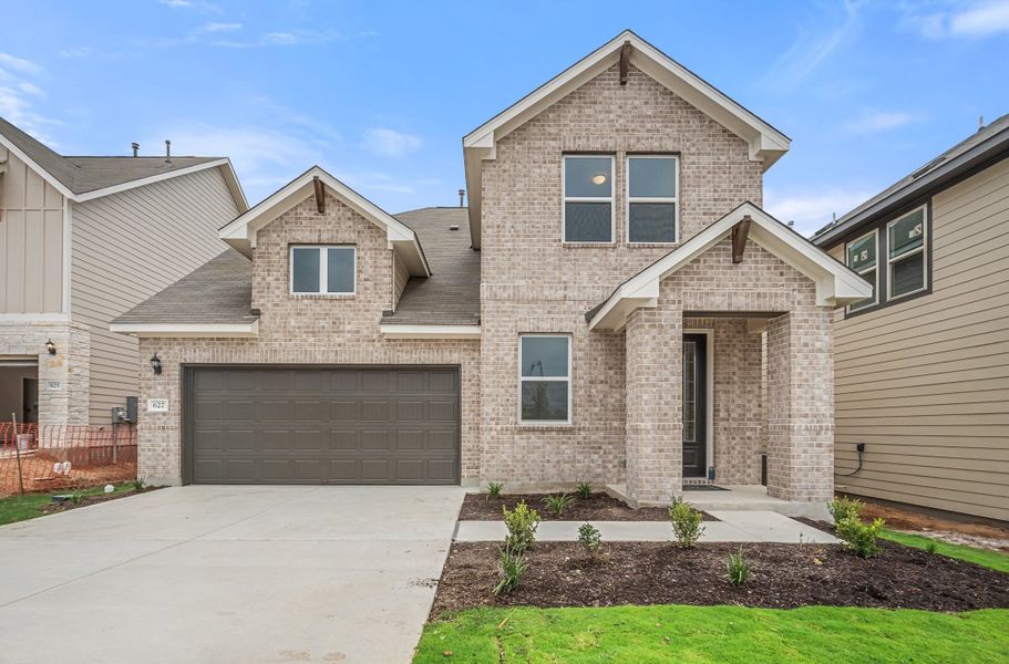 Representative exterior photo of a completed home built from the Sierra by Ashton Woods in Berry Creek Highlands, Georgetown, TX (Image 1).