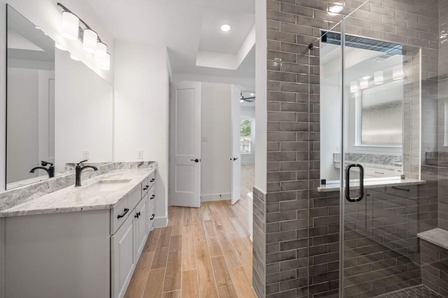 Representative furnished interior of a home built from the Waterloo 60′ Lot by Chesmar Homes in Fulshear Lakes, Fulshear (Image 6).