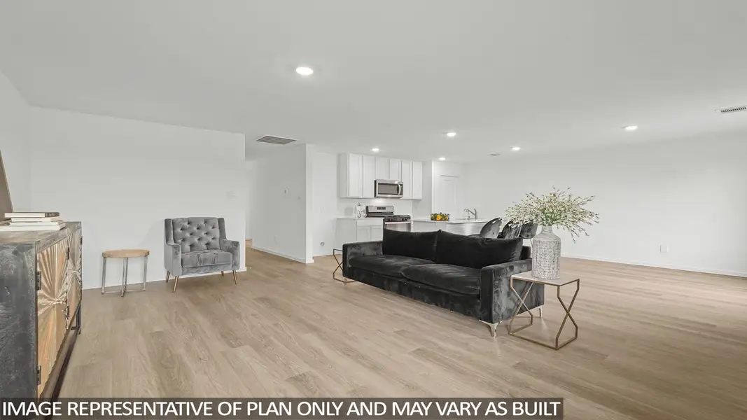 Furnished interior view inside a new home in Sunterra, Katy (Image 4).