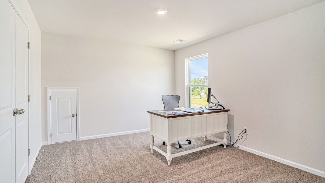 Furnished interior view inside a new home in Magnolia Farms, Florence (Image 15).