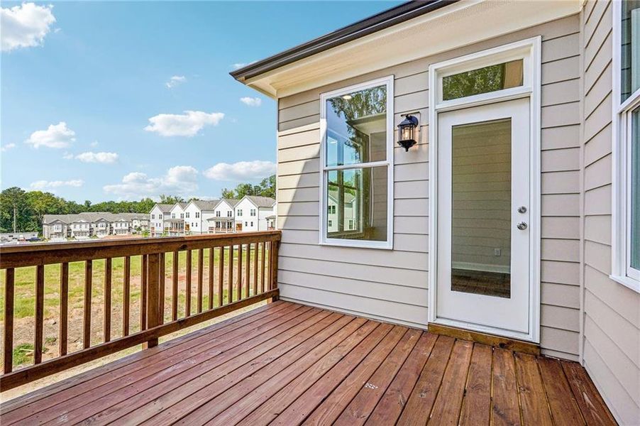 Exterior details and patio area of a home in Waterside Townhomes, Peachtree Corners (Image 3). Exterior details and patio area of a home in Waterside Townhomes, Peachtree Corners (Image 3).