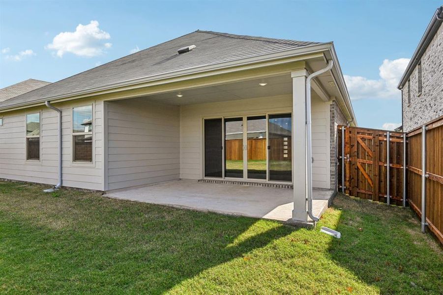 Exterior details and patio area of a home in Lakehaven - Signature Series, Farmersville (Image 26). Exterior details and patio area of a home in Lakehaven - Signature Series, Farmersville (Image 26).