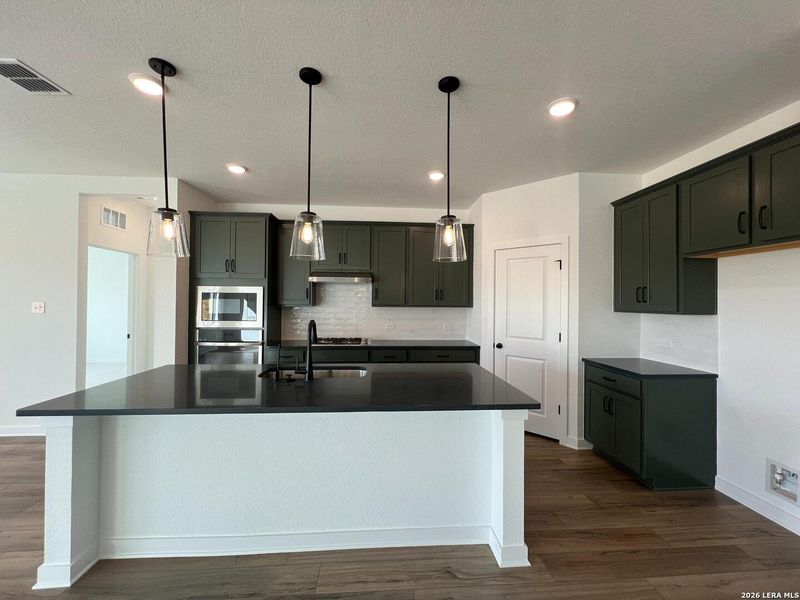 Furnished interior view inside a new home in Nopal Valley, San Antonio (Image 11).