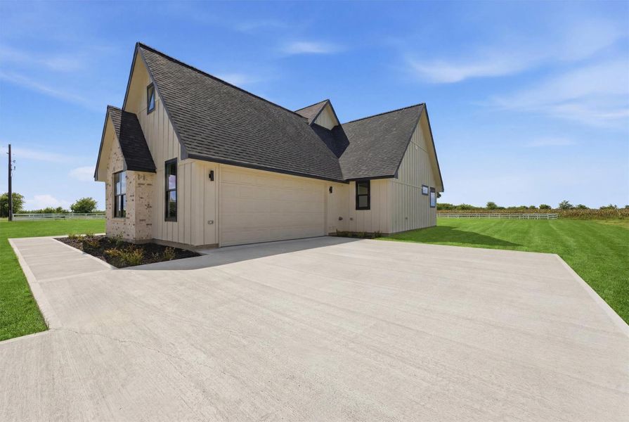 Front exterior of a new home in , Sealy, TX, highlighting curb appeal (Image 25). Front exterior of a new home in , Sealy, TX, highlighting curb appeal (Image 25).
