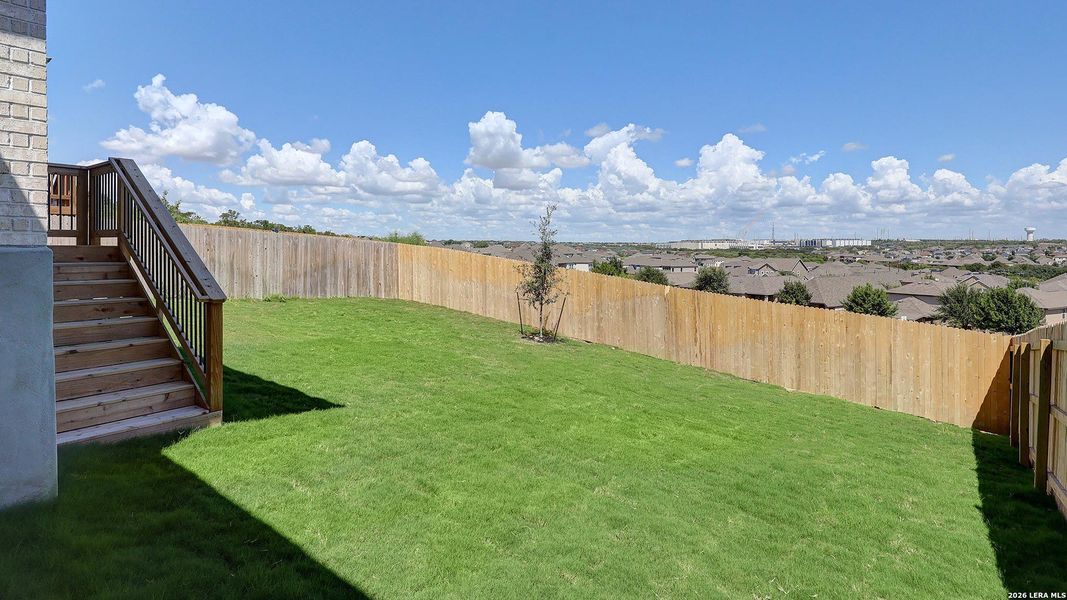 Exterior details and patio area of a home in Ladera, San Antonio (Image 24).