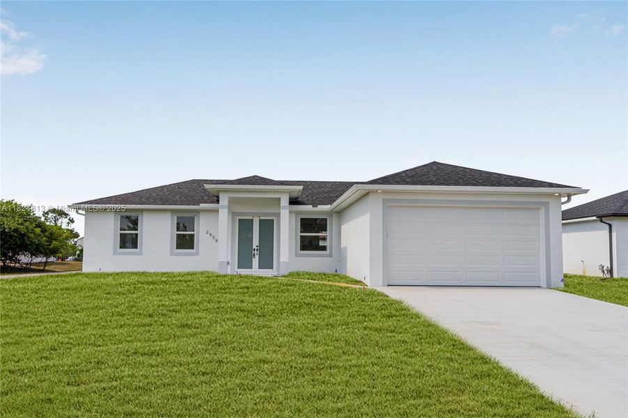 Front exterior of a new home in , Lehigh Acres, FL, highlighting curb appeal (Image 18). Front exterior of a new home in , Lehigh Acres, FL, highlighting curb appeal (Image 18).
