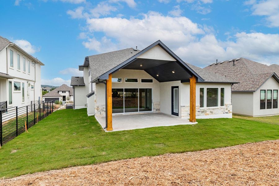 Exterior details and patio area of a home in The Hollows Canyon - 60', Lago Vista (Image 2). Exterior details and patio area of a home in The Hollows Canyon - 60', Lago Vista (Image 2).