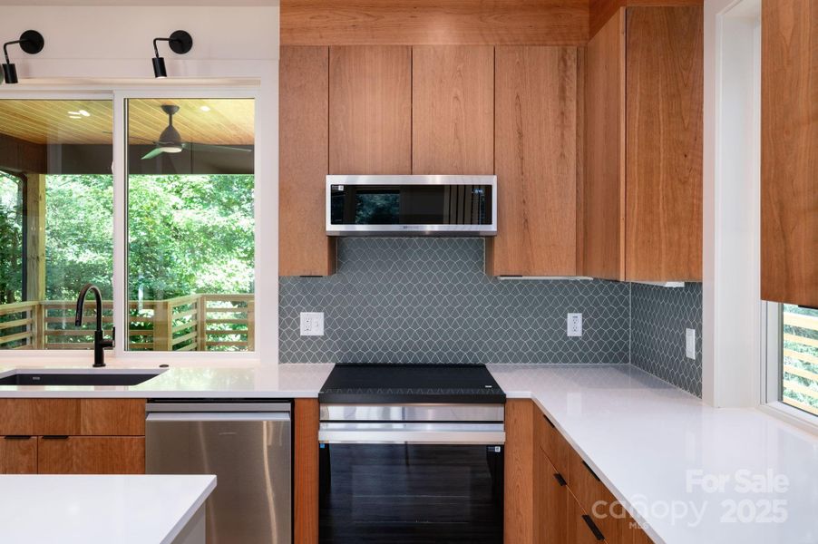 Modern Soft-Close Cabinets and Tile Backsplash Modern Soft-Close Cabinets and Tile Backsplash