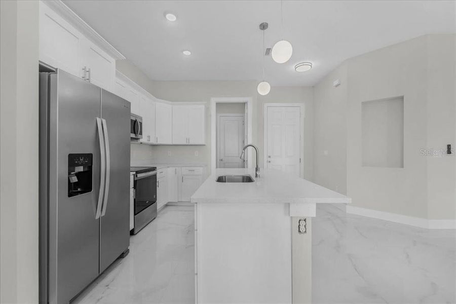 Furnished interior view inside a new home in , Lehigh Acres (Image 9).