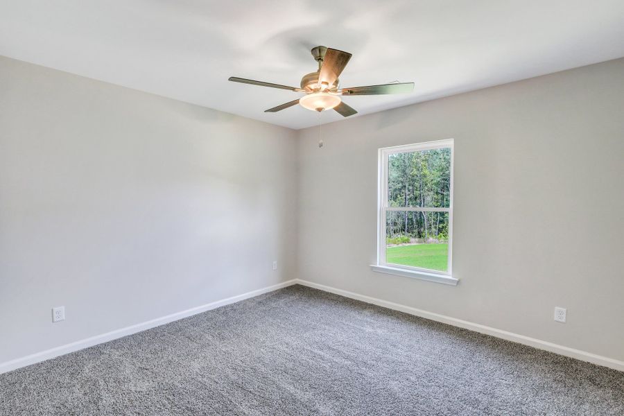 Representative unfurnished interior of a home built from the The Dublin by Smith Family Homes in Settlers Hammock, Kingsland (Image 31).