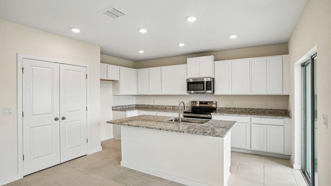 Furnished interior view inside a new home in Willowbrook North, Winter Haven (Image 12).