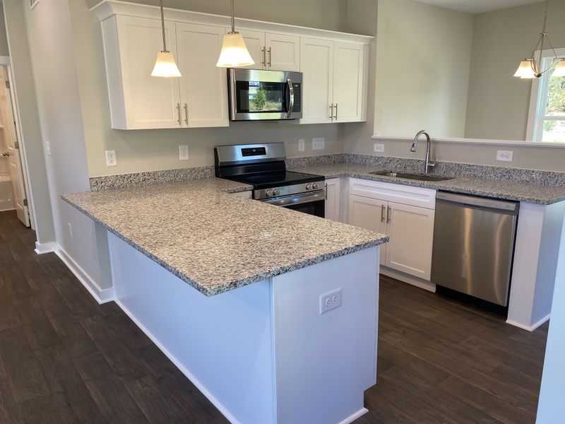 Representative furnished interior of a home built from the Madison by Foundation Home Builders LLC in Pinnix Loop, Burlington (Image 8).