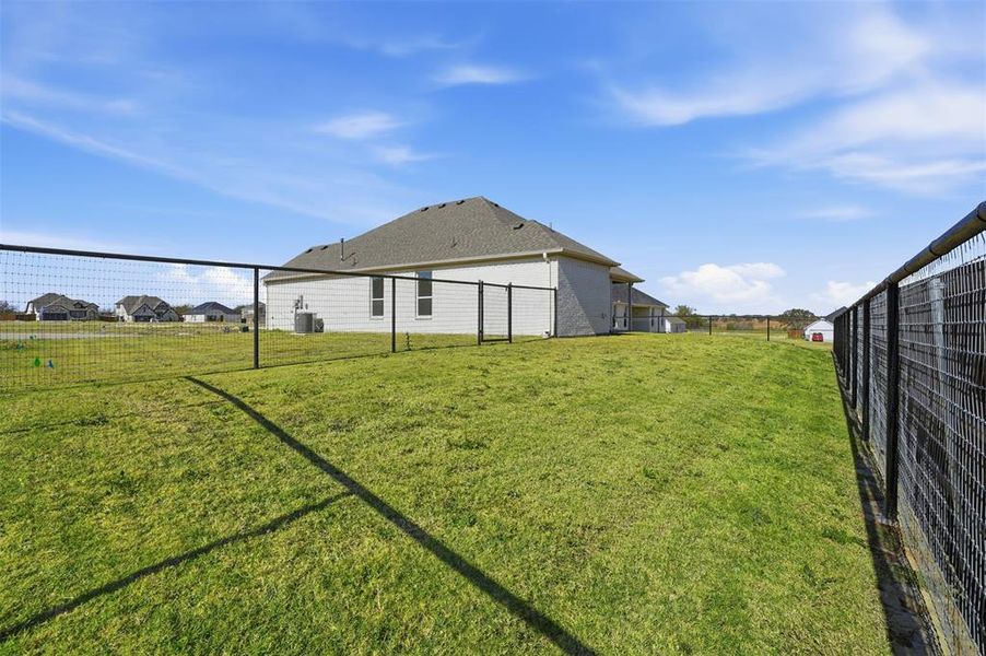 Exterior details and patio area of a home in Wildcat Ridge, Godley (Image 25). Exterior details and patio area of a home in Wildcat Ridge, Godley (Image 25).