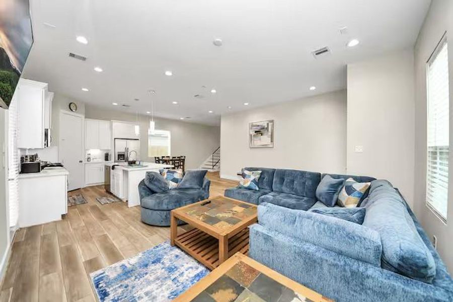 A spacious living area gives you flexibility with furniture placement while keeping the kitchen and dining spaces within easy reach.