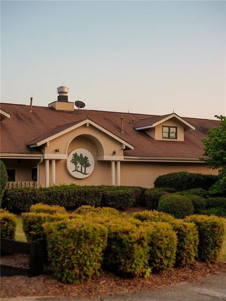 Front exterior of a new home in Knollwood, Johns Creek, GA, highlighting curb appeal (Image 32).