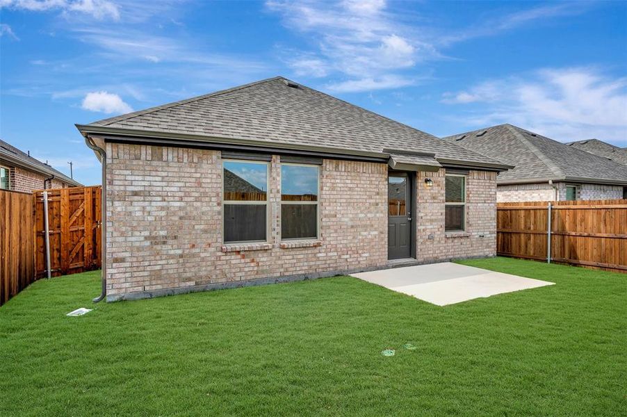 Exterior details and patio area of a home in Elevon, Lavon (Image 3).