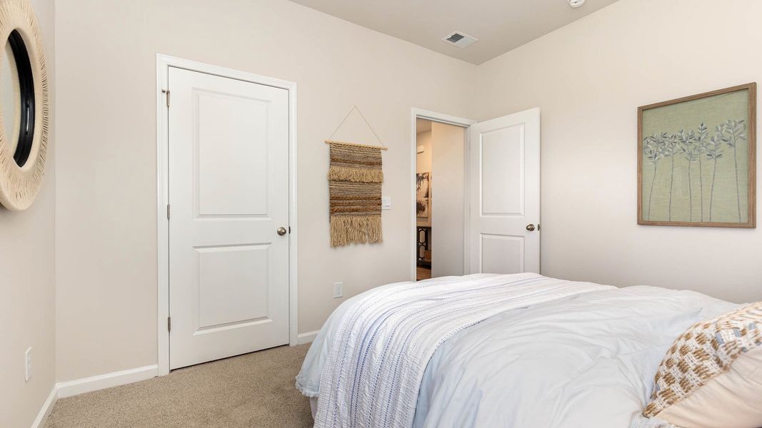 Furnished interior view inside a new home in Stanbury Creek, Supply (Image 18). Furnished interior view inside a new home in Stanbury Creek, Supply (Image 18).