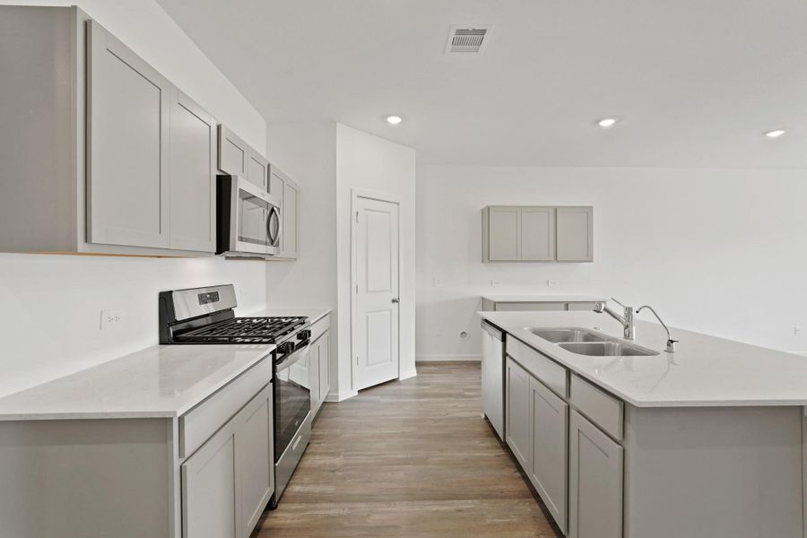 Furnished interior view inside a new home in Grand Pines, Magnolia (Image 6).