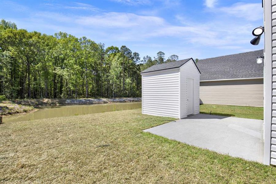 Exterior details and patio area of a home in Royal Oaks Single-Family Homes, Hardeeville (Image 17).