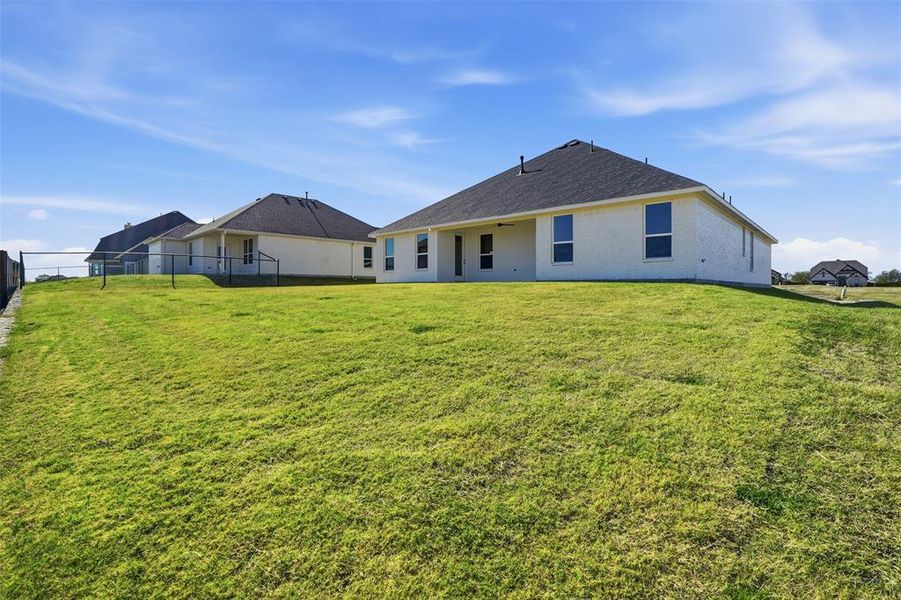 Exterior details and patio area of a home in Wildcat Ridge, Godley (Image 24). Exterior details and patio area of a home in Wildcat Ridge, Godley (Image 24).