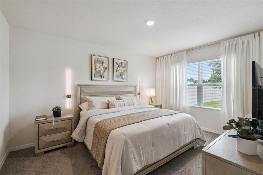 Furnished interior view inside a new home in Windrose, Apopka (Image 17).