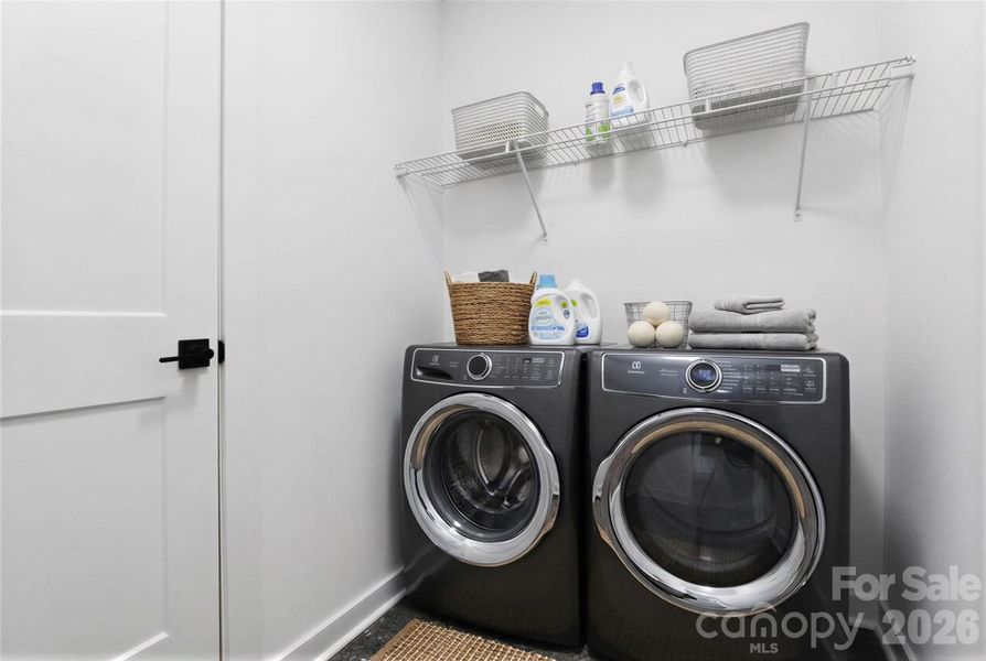 Top floor laundry room. Appliances virtually added for effect.