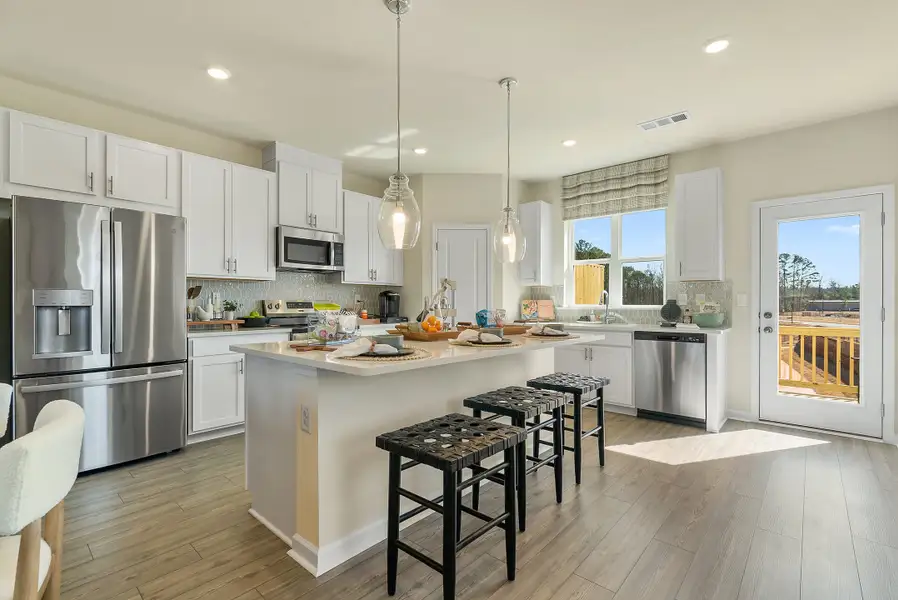 Furnished interior view inside a new home in Chandler Run, Tucker (Image 4).