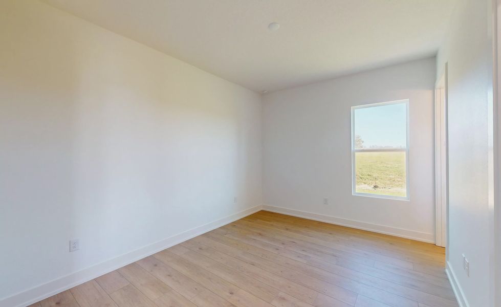 Spacious, unfurnished interior of a new home in West Hill Estates, Dade City (Image 30).