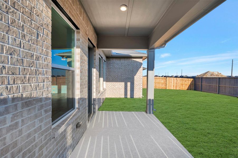 Exterior details and patio area of a home in The Grand Prairie 50’, Hockley (Image 24).