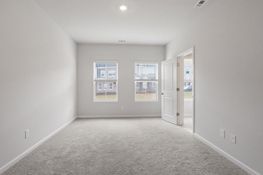 Spacious, unfurnished interior of a new home in Renaissance at White Oak, Garner (Image 18).