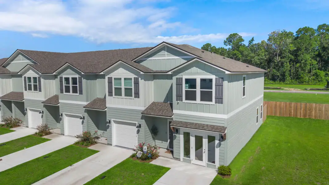 Front exterior of a new home in Horseman's Bluff, Tallahassee, FL, highlighting curb appeal (Image 2). Front exterior of a new home in Horseman's Bluff, Tallahassee, FL, highlighting curb appeal (Image 2).