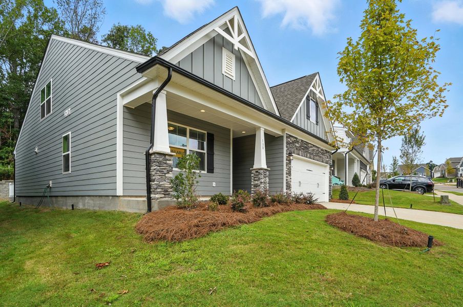 Front exterior of a new home in Villas at Prestwick, Mooresville, NC, highlighting curb appeal (Image 26). Front exterior of a new home in Villas at Prestwick, Mooresville, NC, highlighting curb appeal (Image 26).