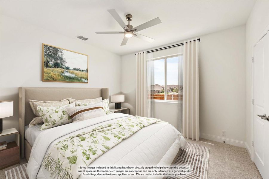 Bedroom with upholstered headboard, ceiling fan, carpet flooring, and a window with white curtains Bedroom with upholstered headboard, ceiling fan, carpet flooring, and a window with white curtains