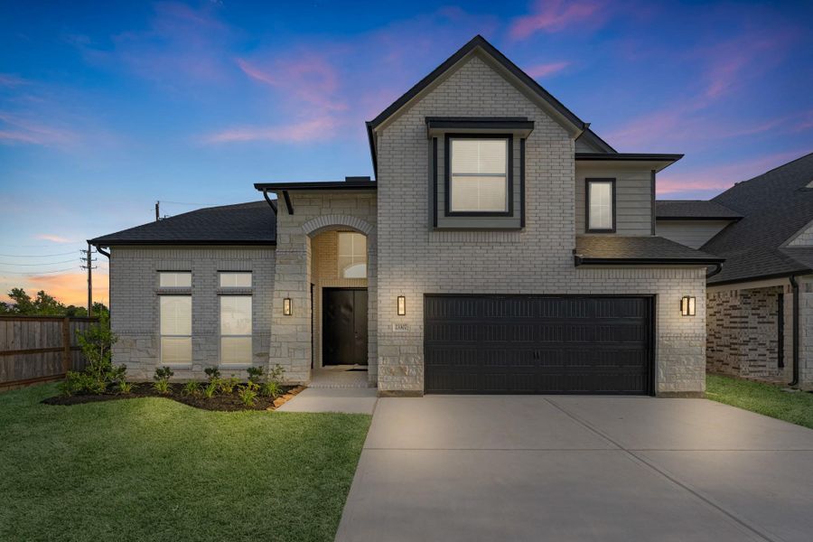 Front exterior of a new home in Morton Creek Ranch, Katy, TX, highlighting curb appeal (Image 21). Front exterior of a new home in Morton Creek Ranch, Katy, TX, highlighting curb appeal (Image 21).