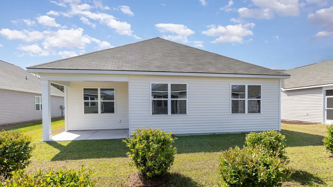 Exterior details and patio area of a home in Dove Crossing, Conway (Image 3).