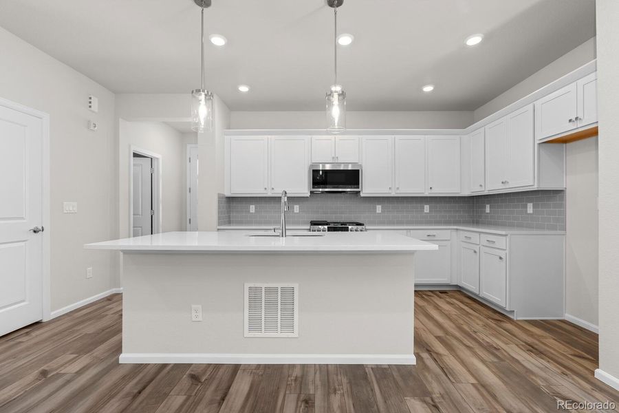 Furnished interior view inside a new home in The Villas Collection at Sterling Ranch, Littleton (Image 7).