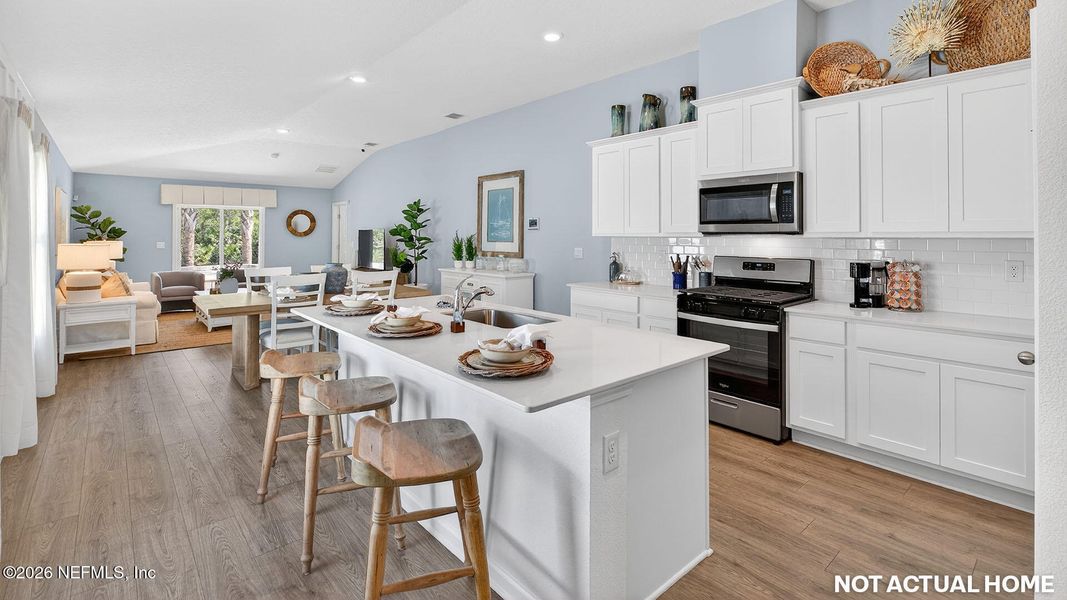 Furnished interior view inside a new home in Grand Reserve, Bunnell (Image 5).