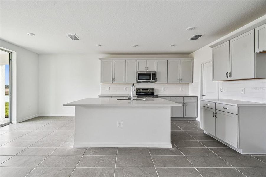Furnished interior in a model home at Southpointe in Palmetto (Image 39).