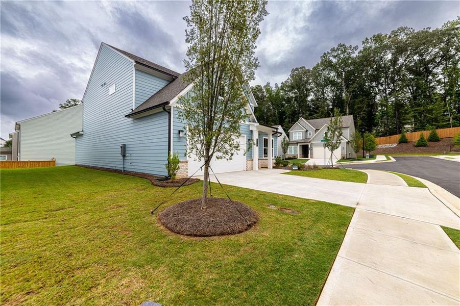 Front exterior of a new home in Enclave at Edgewater, Canton, GA, highlighting curb appeal (Image 35).