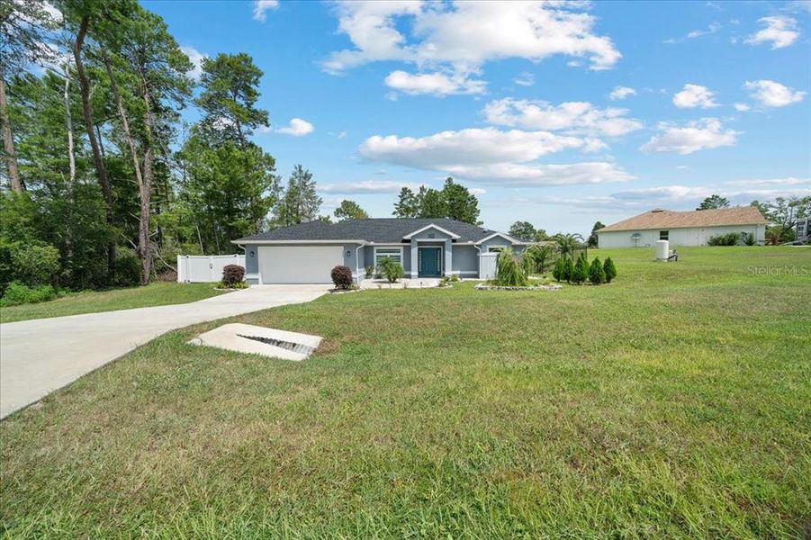 Front exterior of a new home in , Ocala, FL, highlighting curb appeal (Image 1). Front exterior of a new home in , Ocala, FL, highlighting curb appeal (Image 1).